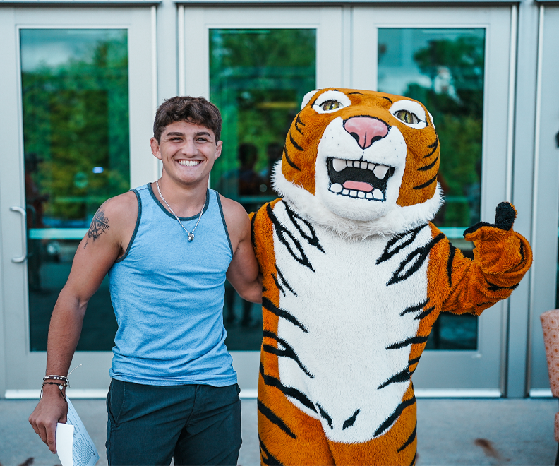 Student With Tiger Mascot