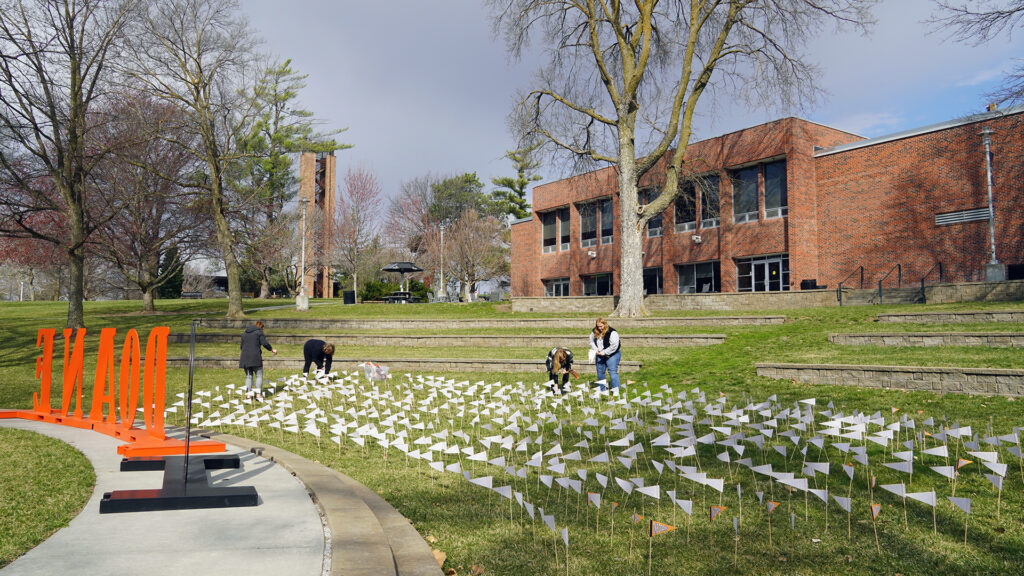 Michelle Faltin ’99, Megan Forbes ’06, Sandy Koll, and Halie Rohe ’21 worked diligently to place nearly 700 ONE DOANE pennants in Cassel Outdoor Theatre. Each pennant represented $200 raised during the One Day. One Doane. campaign.